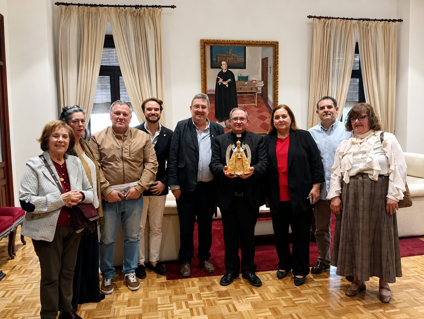 EL OBISPO RECIBE A LA JUNTA DE GOBIERNO DE LA HERMANDAD
